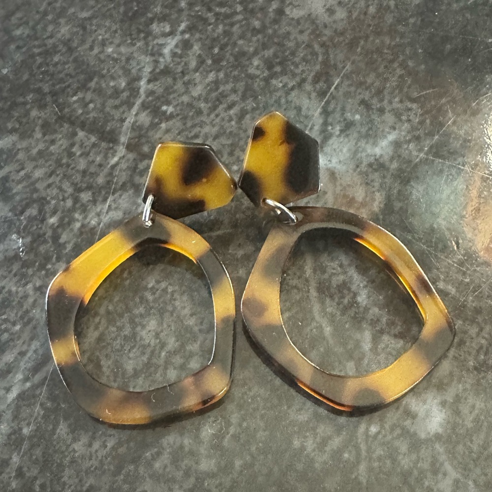 Tortoiseshell earrings.